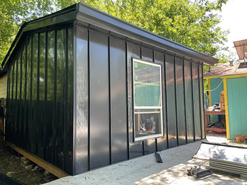 Black standing seam metal wall panels for Roof Inspection in Turpin Hills